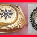 Two rings: a gold signet with a black six-pointed star motif on the left and a silver round pendant with a woven knot design on the right.
