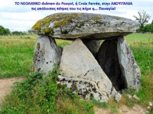 Prehistoric dolmen with a mossy, flat capstone resting on three upright stones in a grassy field.