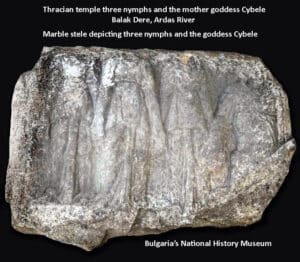 Stone relief on a marble slab showing three standing female figures, likely nymphs and the goddess Cybele, carved in shallow relief. From Bulgaria's National History Museum.
